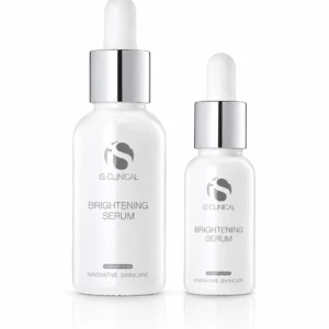Two white glass serum bottles with droppers, labeled 'Brightening Serum' by iS CLINICAL, on a white background.