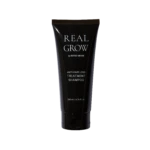 Real Grow anti-hair loss treatment shampoo tube on a black background, 200 ml
