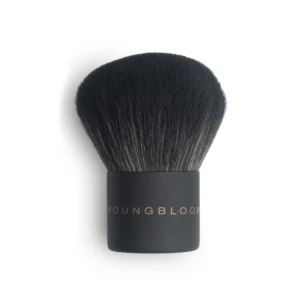 Close-up of a dense black makeup brush head with a dark handle visible at the bottom.
