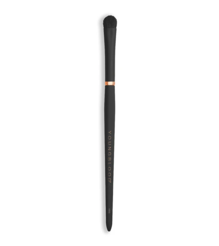 Vertical image of a black makeup brush with dense bristles against a white background; handle shows faint vertical text.