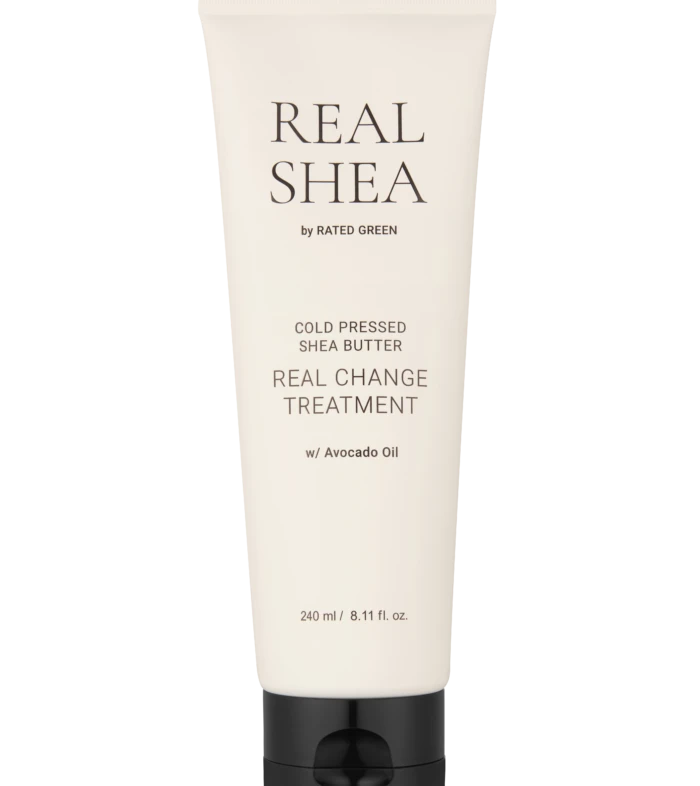 Beige skincare tube labeled Real Shea by Rated Green; cold-pressed shea butter treatment with avocado oil (240 ml).