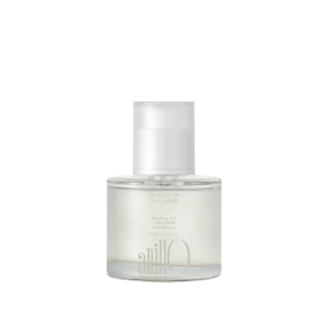 Bottle of nail oil with a white cap, labeled 'oil', set against a white background for nail care.