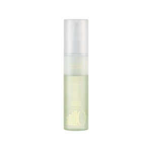 Tall frosted spray bottle with pale green liquid, labeled Patchouli Garden Damage Repair Cream Hair Mist.