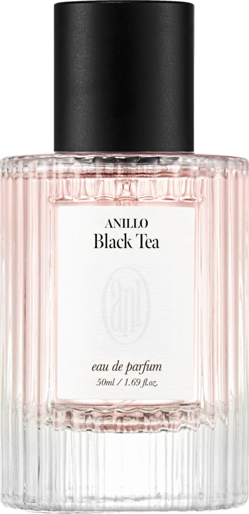 Front view of a pale pink perfume bottle with a black cap, label reads ANILLO Black Tea, eau de parfum 50 ml.