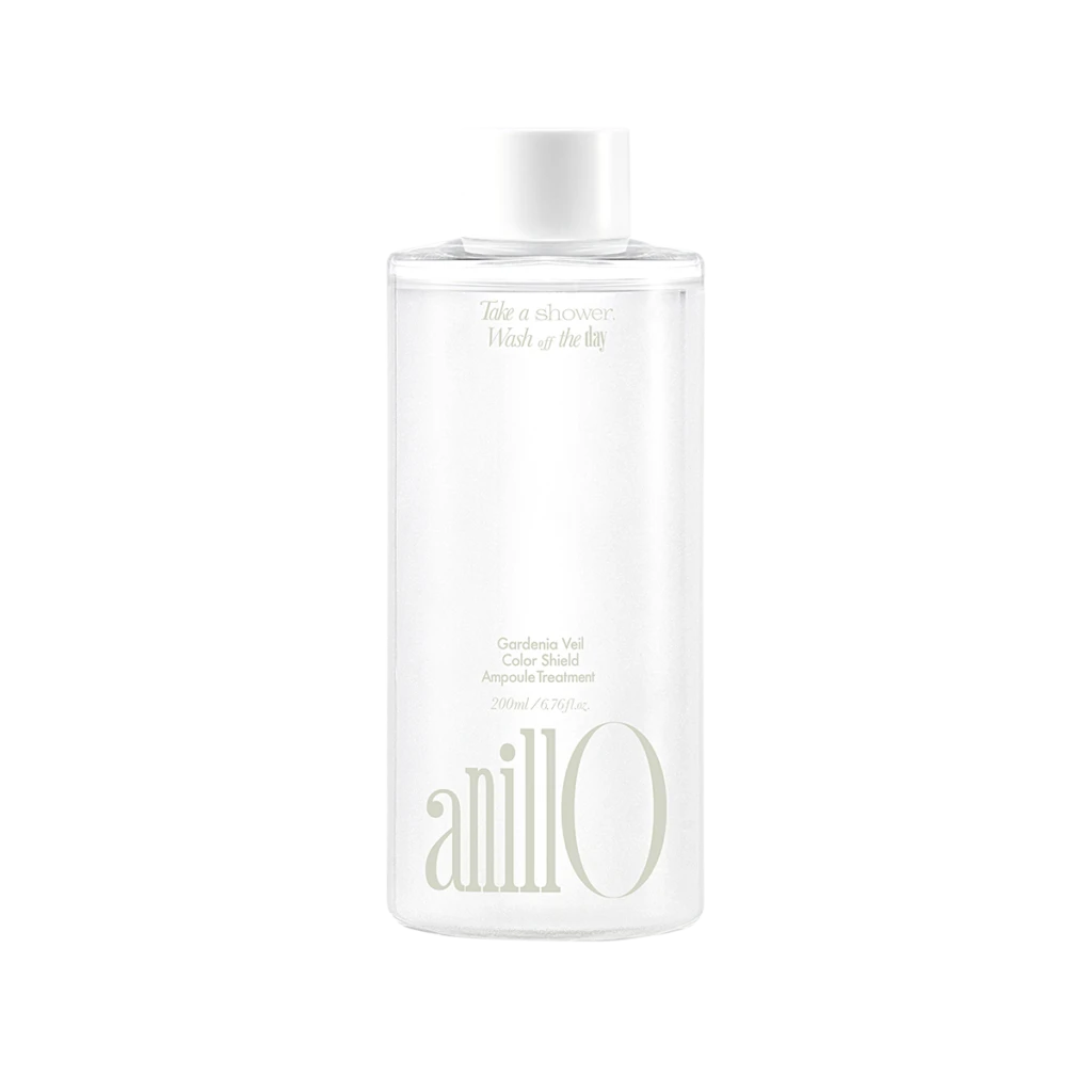 Bottle of Anillo Gardenia Veil Ampoule Treatment cosmetic product, white cylindrical container with soft gold text and cap.
