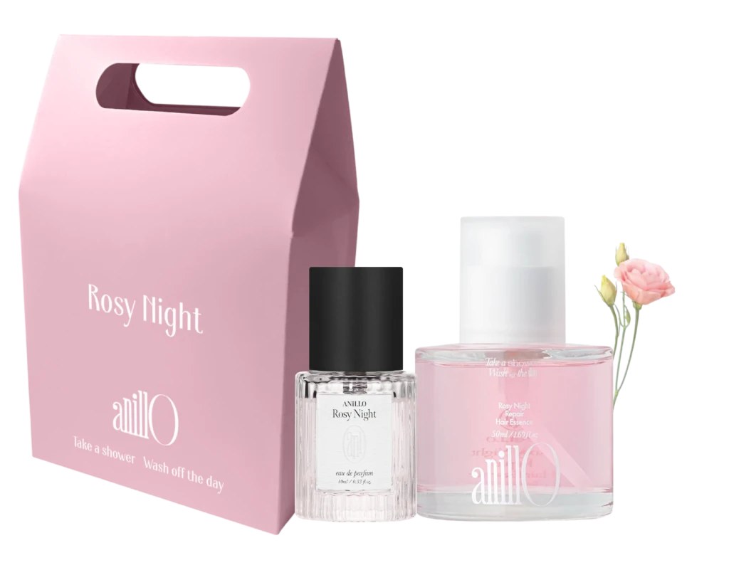 Pink Rosy Night perfume gift set with a pink box, clear bottle, and soft pink accents including a flower bouquet