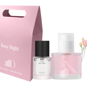 Pink Rosy Night perfume gift set with a pink box, clear bottle, and soft pink accents including a flower bouquet