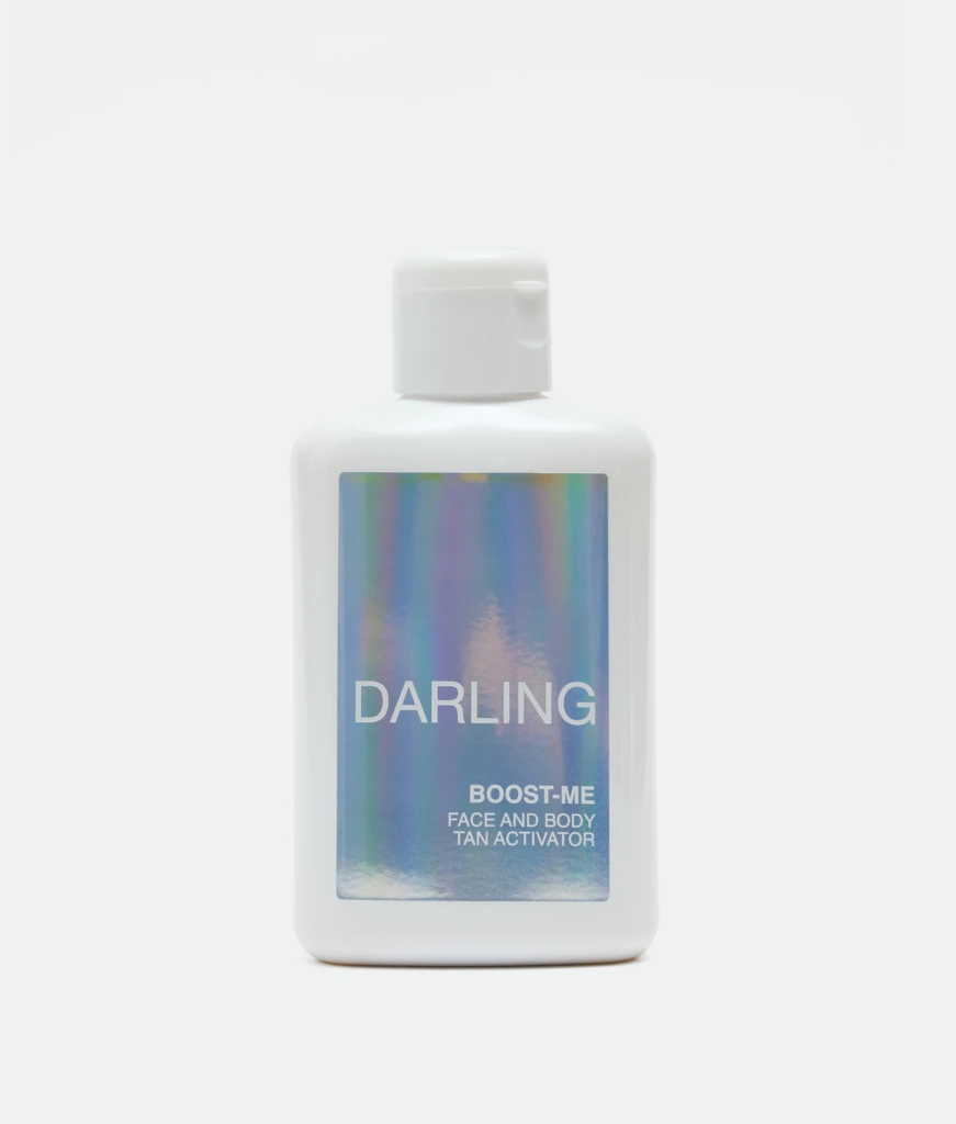 White pump bottle with a holographic label reading DARLING.