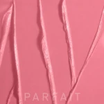 Close-up of a pink abstract surface with glossy ribbon-like stripes and the faint word PARFAIT at the bottom.