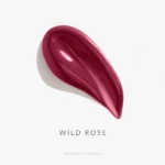 Glossy pink, petal-like blob with the words WILD ROSE and Ekabeauty logo on a white background (cosmetic product image).