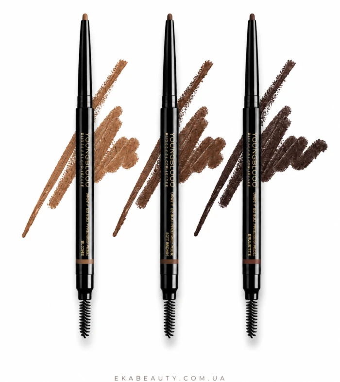 Three black YOUNGBLOOD cosmetic pencil eyeliners with brown, medium brown, and dark brown swatches behind them on a white background, with the website ekabeauty.com.ua at the bottom.