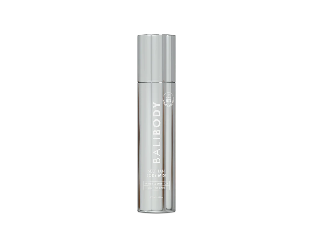 Tall silver cylindrical bottle of Self Tan Body Mist with a circular DHA badge on the label