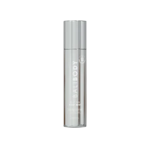 Tall silver cylindrical bottle of Self Tan Body Mist with a circular DHA badge on the label