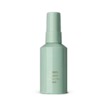 Mint-green deodorant bottle standing on a white surface, label with gold text visible (No Green Deodorant).