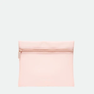 Light pink zippered pouch with visible zipper and the word DARLING printed faintly on the front.
