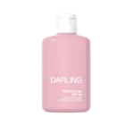 Pink bottle of Darling Protect-Me SPF 30 sunscreen lotion with a white cap, shown from the front.