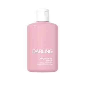 Pink bottle of Darling Protect-Me SPF 30 sunscreen lotion with a white cap, shown from the front.