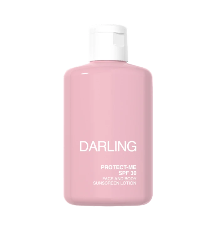 Pink bottle of Darling Protect-Me SPF 30 sunscreen lotion with a white cap, shown from the front.