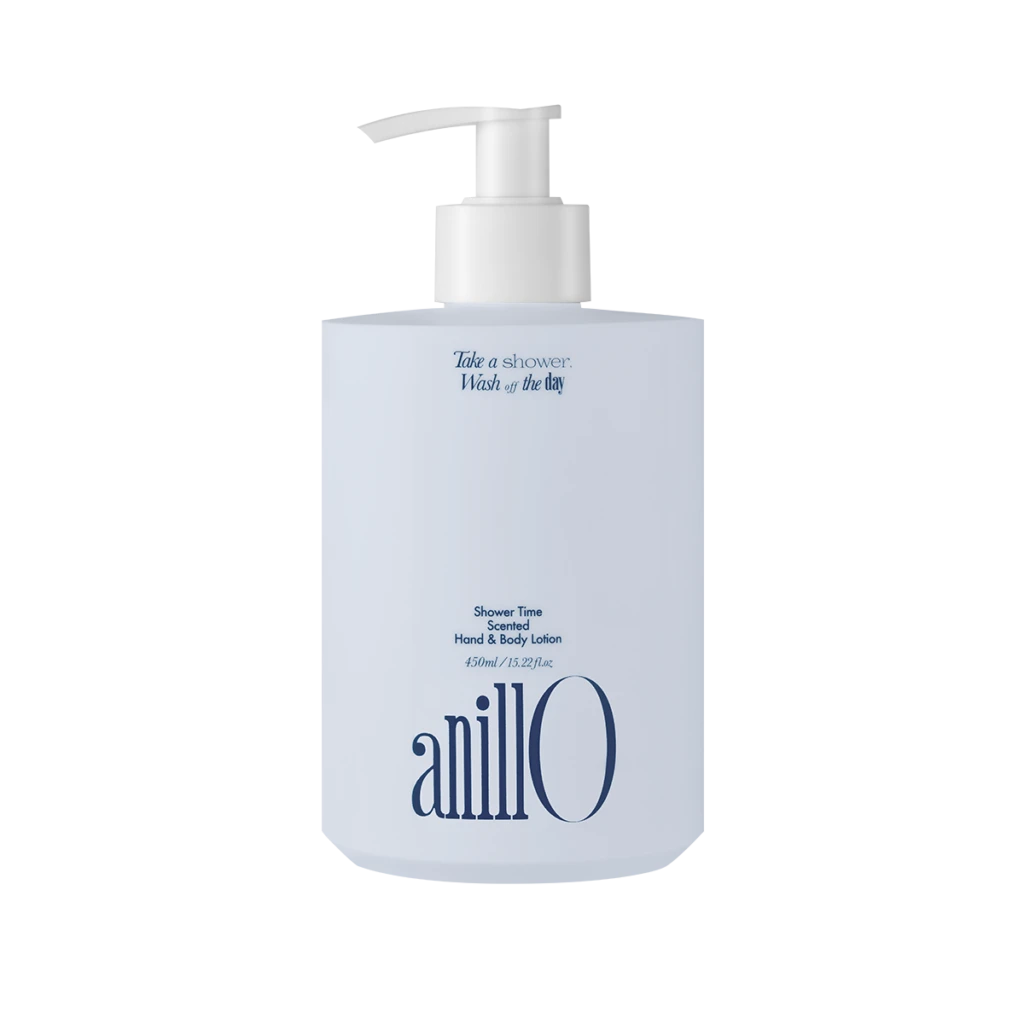 White lotion pump bottle with light blue label; reads 'Take a shower. Wash off the day' and 'Shower Time Scented Hand & Body Lotion' with the brand 'anillo' at the bottom.