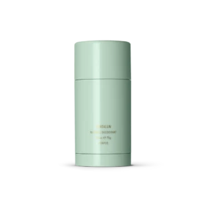 Mint green cylindrical deodorant container with a matching cap, standing upright with subtle gold text reading 'Santalum Natural Deodorant' on the front