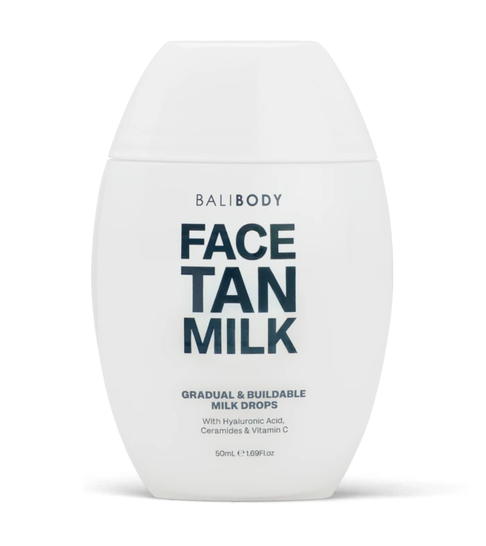 White Bali Body bottle labeled 'FACE TAN MILK' with 'Gradual & Buildable Milk Drops' text visible on a white background.