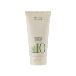 Cream-colored tube of Anillo Patchouli Garden Damage Repair Hair Treatment (150 ml) shown upright, front view with green logo text on the bottle.