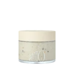 Cream-colored lid on a glass jar of bath salt with speckled crystals visible through the clear body; brand name 'anillo' on the label