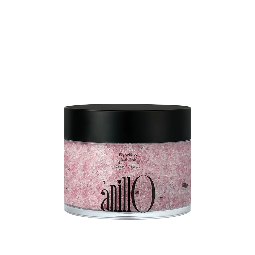 Pink Fig Whisky Bath Salt in a clear jar with a black lid; brand name Anilo visible on the jar.