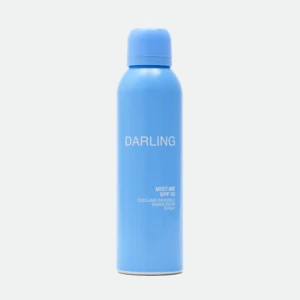 Blue cylindrical blue bottle with matching blue cap; the word 'DARLING' is visible on the bottle.