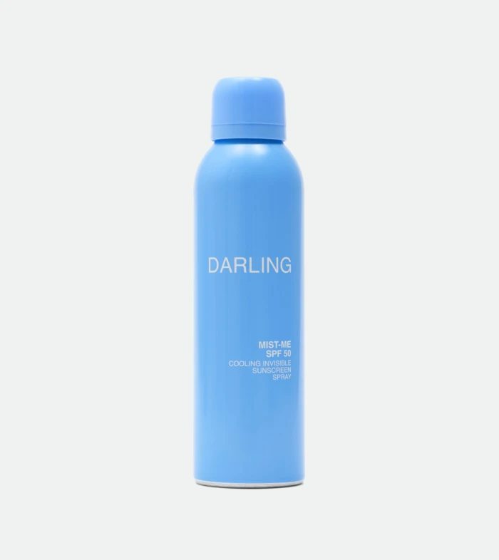 Blue cylindrical blue bottle with matching blue cap; the word 'DARLING' is visible on the bottle.