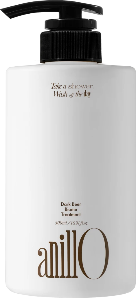 White pump bottle with a black nozzle, featuring brown text: 'Take a shower, Wash off the day' and 'Dark Beer Biome Treatment' 500 ml.