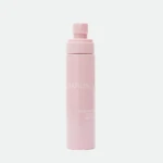 Close-up of a pink spray bottle with a small nozzle, the label reads 'DARLING' against a white background