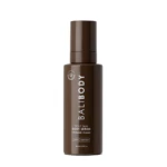 Brown pump-top bottle for Self Tan Body Serum, vertical label reading 'Self Tan Body Serum' with Niacinamide + Ceramide details on brown packaging