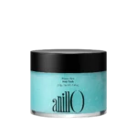 Turquoise jar of Anilo Shower Time Body Scrub with a black lid and silver base.