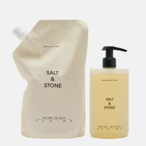 Beige Salt & Stone refill pouch and matching pump bottle of body wash with pale yellow liquid.
