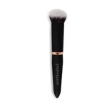 Makeup brush with black handle and white-to-black bristles fading at the top, handle showing partial white lettering.