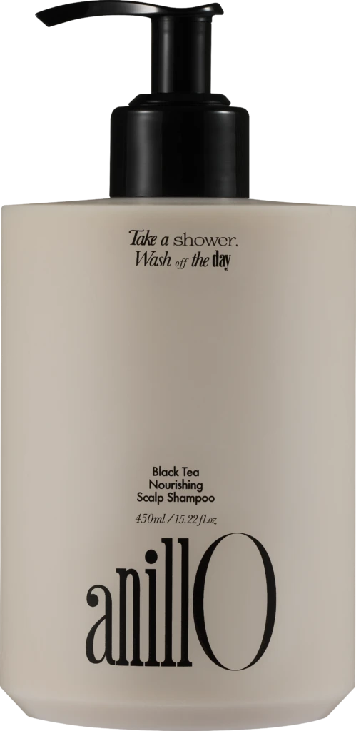 Beige shampoo bottle with black pump; label reads 'Take a shower, Wash off the day' and 'Black Tea Nourishing Scalp Shampoo'
