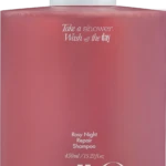 Pink pump bottle of Rosy Night Repair Shampoo with white pump; text reads 'Take a shower, Wash off the day' and 'Rosy Night Repair Shampoo' (450 ml); product image focusing on bottle.