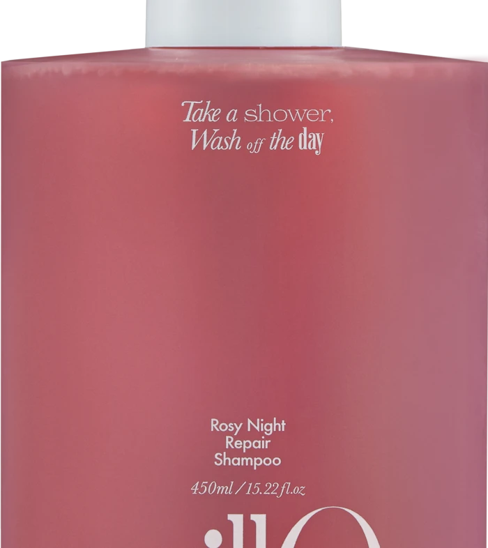 Pink pump bottle of Rosy Night Repair Shampoo with white pump; text reads 'Take a shower, Wash off the day' and 'Rosy Night Repair Shampoo' (450 ml); product image focusing on bottle.