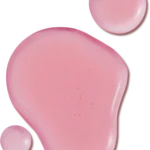 Abstract close-up of pink circular blobs with tiny water droplets on their surface against a black background.