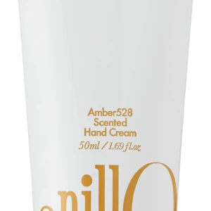White hand-cream tube with orange lettering, reading 'Amber528 Scented Hand Cream' and '50ml / 1.69 fl. oz', bottom orange cap; includes a decorative wordmark along the side and the phrase 'Take a shower, Wash off the day' near the top.