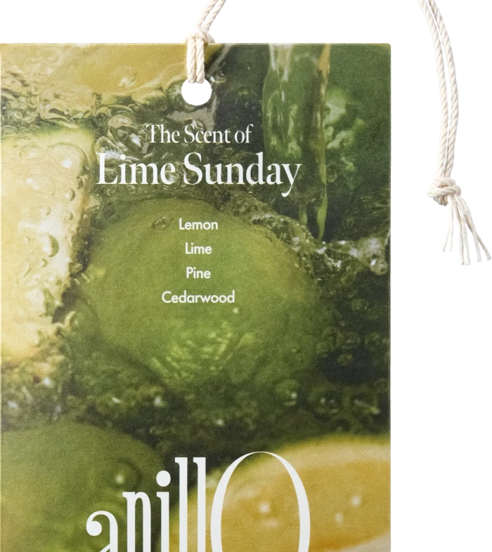 Tag advertising 'The Scent of Lime Sunday' with scent list Lemon, Lime, Pine, Cedarwood, tied with a rope loop