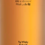 Bottle of amillO Fig Whisky Body Oil with a black cap and orange gradient label; slogan reads 'Take a shower, Wash off the day' (100 ml).