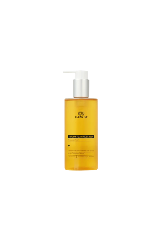 Yellow cleanser bottle with white pump against a black background; label reads 'Hydro Foam Cleanser'.