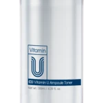 Clear cosmetic bottle with silver pump and transparent cap, labeled Vitamin U Ampoule Toner, 130 ml capacity.