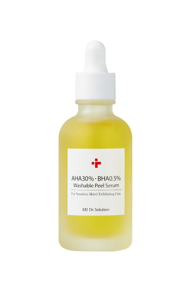 Yellow exfoliating peel serum bottle with dropper cap and label reading AHA30% BHA0.5% Washable Peel Serum on white background.