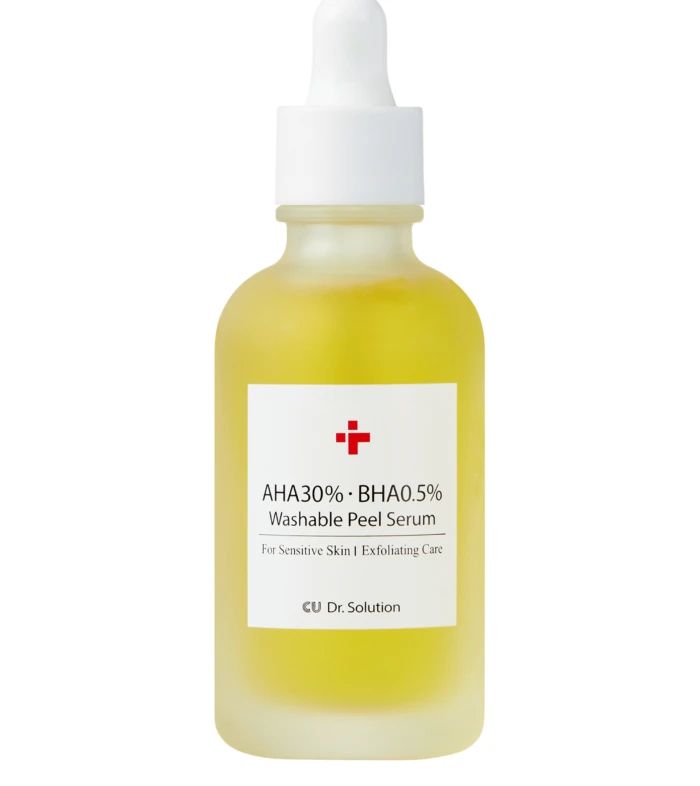 Yellow exfoliating peel serum bottle with dropper cap and label reading AHA30% BHA0.5% Washable Peel Serum on white background.