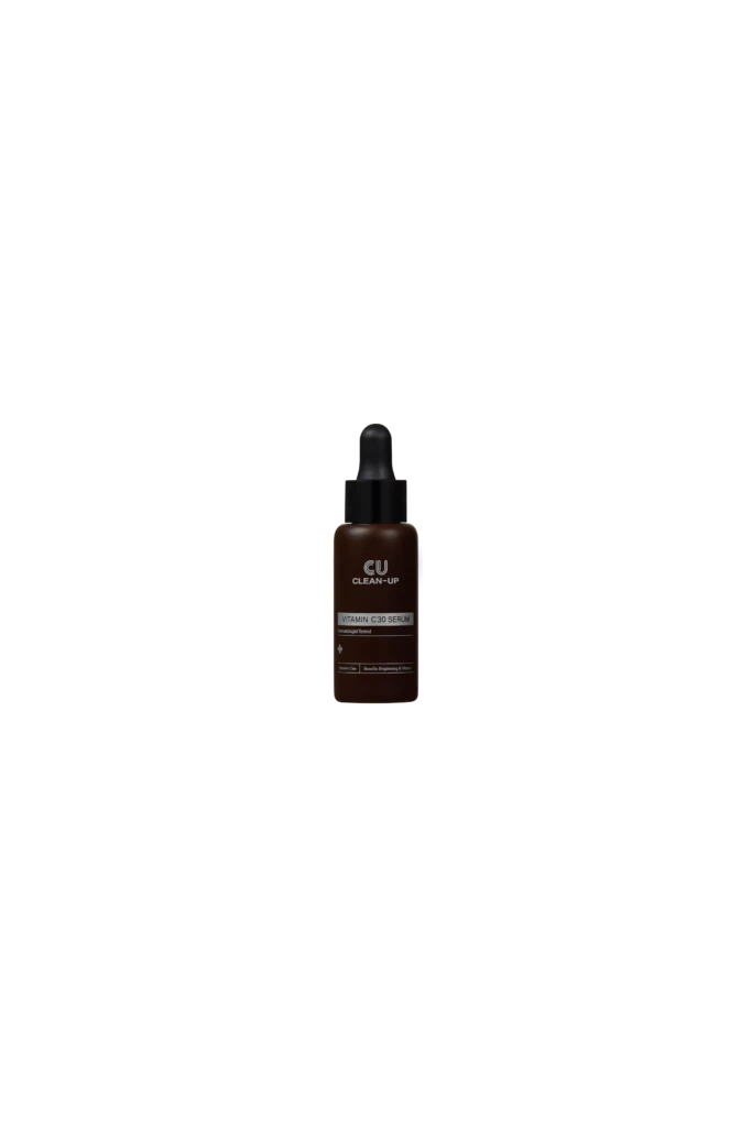 Brown glass dropper bottle of Vitamin C 30 Serum centered on a black background, labeled and ready for use.