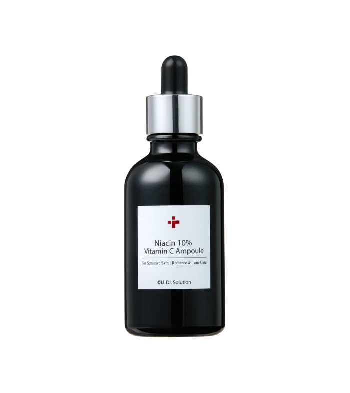 Dark glass dropper bottle with a silver collar and white label reading Niacin 10% Vitamin C Ampoule against a black background, close-up.