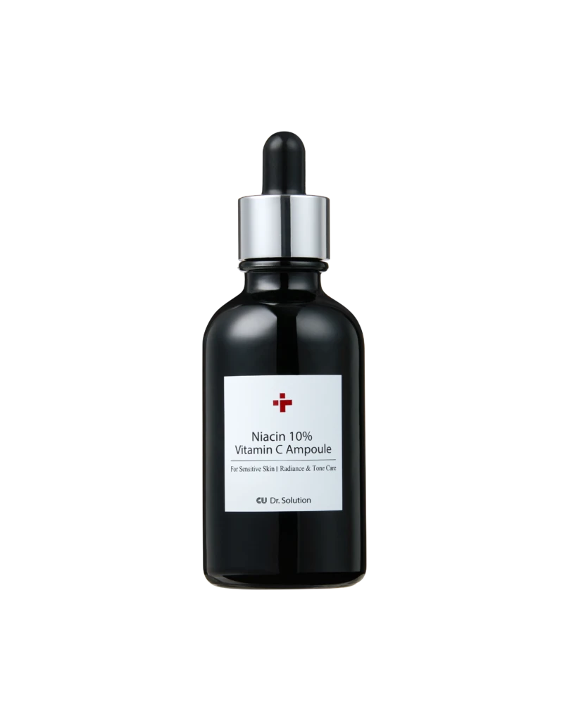 Dark glass dropper bottle with a silver collar and white label reading Niacin 10% Vitamin C Ampoule against a black background, close-up.